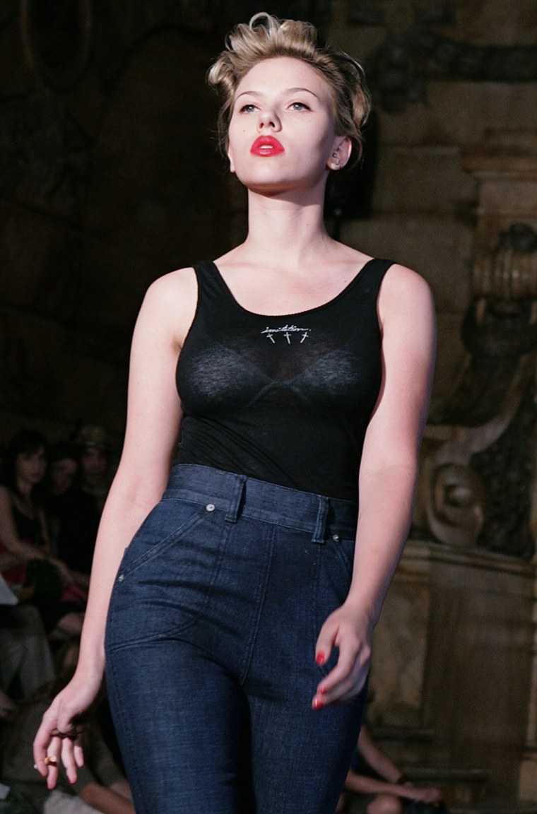 Actress Scarlett Johansson models a look from the  Imitation of Christ spring 2006 collection, Friday Sept. 9, 2005, during Fashion Week in New York. (AP Photo/Diane Bondareff)