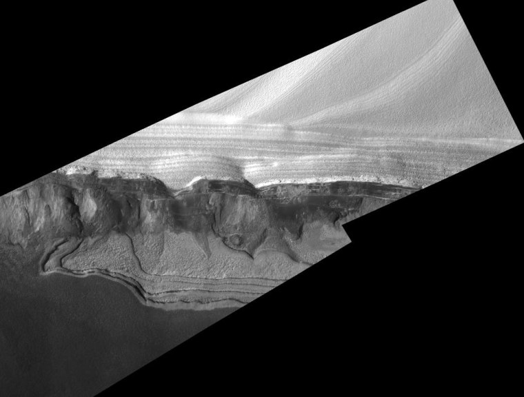 This view shows sharp detail of a scarp at the head of Chasma Boreale, a large trough cut by erosion into the martian north polar cap and the layered material beneath the ice cap. The picture is a mosaic of two images acquired in January 2005 by the Mars Orbiter Camera on NASA's Mars Global Surveyor, using a resolution-enhancing technique called \"compensated pitch and roll targeted observation.\" The camera team considers this the best pair of images yet acquired using that technique.   During each northern summer on Mars, there occurs a narrow window in time of two to three months when conditions are ideal to image the north polar cap at high resolution. Throughout this period, the atmosphere is generally clear over the cap, and the seasonal carbon-dioxide frost from the previous winter and spring has sublimed away, permitting a good view of the surface geology. The two images in this mosaic were acquired during this brief period during the most recent northern summer. Within a few weeks of when the
