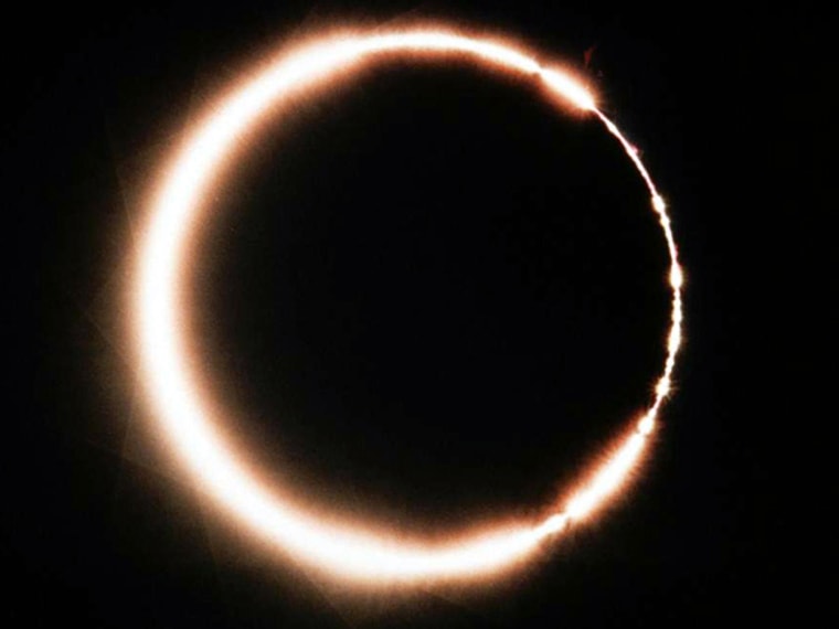 A \"diamond necklace,\" formed by the sun's chromosphere and prominences ringing the moon during an annular solar eclipse.
Date Photographed 
May 30, 1984 
 Location Information 
Picayune, Mississippi, USA