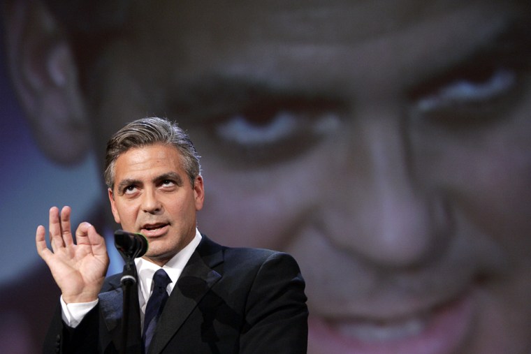 Actor and director George Clooney addresses the audience before receiving with Grant Heslov the best script award for their latest movie \" Good night, and good luck \" at the 62nd edition of the Venice Film Festival in Venice's Lido, northern Italy, Saturday, Sept. 10, 2005. (AP Photo/Domenico Stinellis)