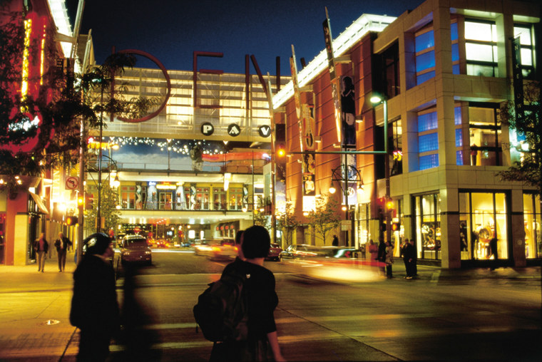 Denver Pavillions on the 16th Street Mall has 50 shops and restaurants under a dramatic block-long \"\"Denver\"\" sign. Photo by Stan Obert. Denver Metro Convention & Visitors Bureau.