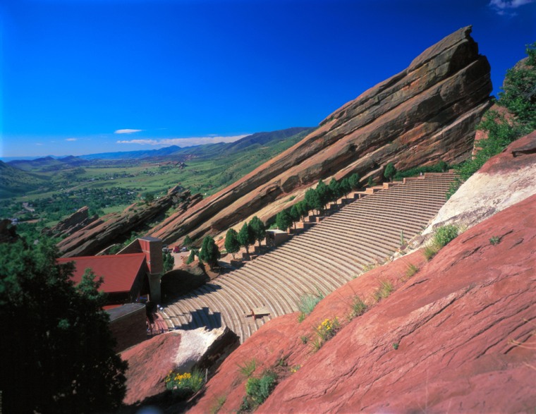 Red Rocks Amphitheatre is a 9,000-seat arena that has been carved out of 70 million year old red sandstone rocks. Located 12 miles west of Denver, it is a Denver city park that has hosted everyone from the Beatles to top symphony orchestras. Photo by Ron Ruhoff. Denver Metro Convention & Visitors Bureau.