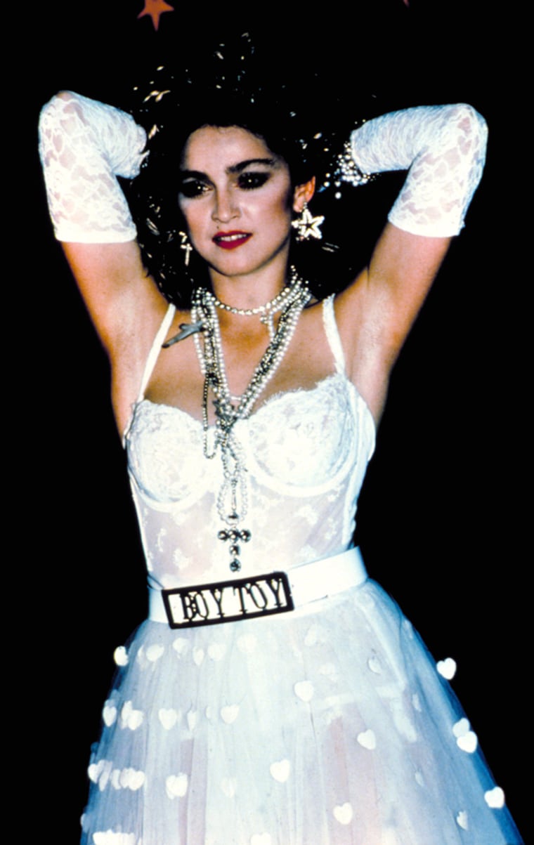 Madonna, LIKE A VIRGIN, 1985 (wearing famous Boy Toy belt). Like a Virgin\" is the first number-one single from American singer Madonna, topping the charts at the end of 1984, and the beginning of 1985. Madonna became popular with teenagers due to her sexy appearance, and it wasn't long before teenage girls were dressing up as her.