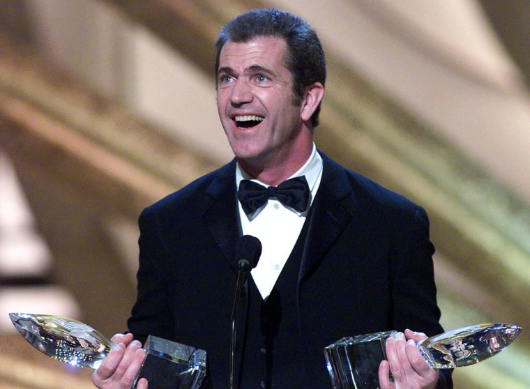 Australian actor Mel Gibson accepts his two awards