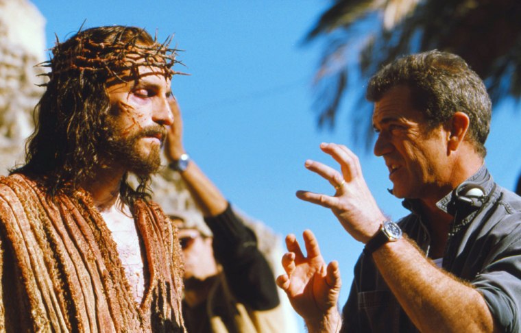 ** FILE ** Mel Gibson, right, directs Jim Caviezel on the set of Gibson's movie \"The Passion of The Christ,\" in this undated publicity photo. The film released in February 2004, has stirred controversy over his depiction of Jews. (AP Photo)