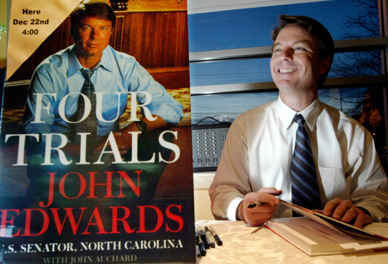 SENATOR EDWARDS SMILES WHILE SIGNING HIS BOOK IN NEW HAMPSHIRE.