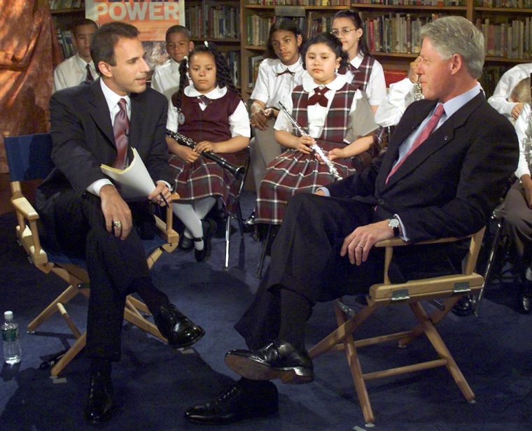US President Bill Clinton (R) is interviewed on th