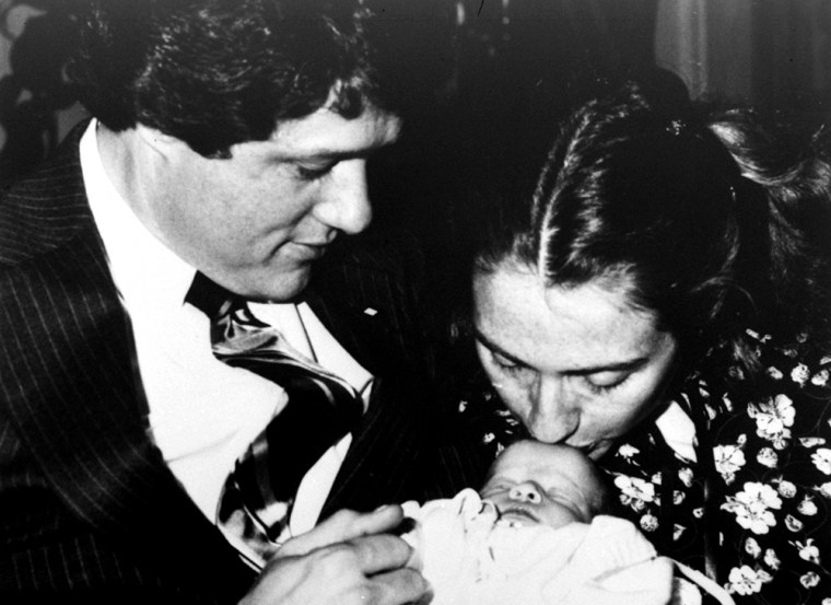 Gov. Bill Clinton, wife Hillary Rodham, and week-old baby Chelsea pose for a family picture, March 5, 1980.  It's the couple's first child.  (AP Photo/Donald R. Broyles)