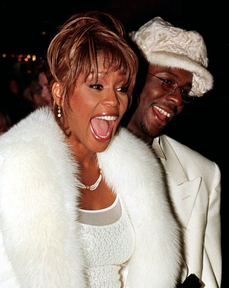 File photo shows Whitney Houston and her husband Bobby Brown posing in Beverly Hills