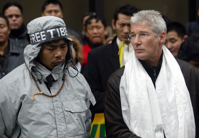 Gere meets with Tibetan hunger strikers outside the United Nations in New York on their 12th day of an indefinite hunger strike in 2004. Gere is a co-founder of the Tibet House and is chairman of the Board of Directors for the International Campaign for Tibet.