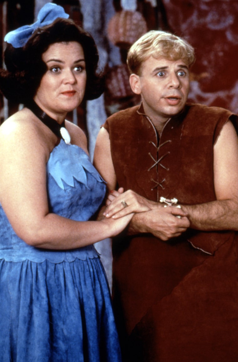 THE FLINTSTONES, Rosie O'Donnell, Rick Moranis, 1994, (c)Universal Pictures/courtesy Everett Collection