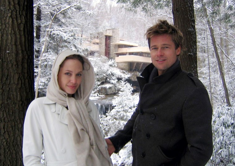 Frank Lloyd Wright's Fallingwater looms behind Brad Pitt and Angelina JolieThursday, Dec. 7, 2006 in Mill Run, Pa. The couple visited Frank Lloyd Wright's architectural masterpiece for Pitt's birthday. Cara Armstrong, Fallingwater's curator of education, says Pitt said he wanted to experience Fallingwater ever since he took an architectural history course in college.