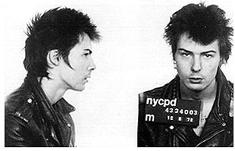 Sid Vicious, bassist for the Sex Pistols, was arrested by New York police for the October 1978 murder of girlfriend Nancy Spungen. Sid's subsequent drug overdose spared him the indignity of a homicide trial.
