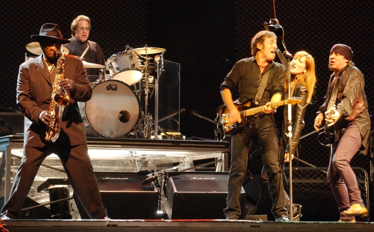 **FILE**Bruce Springsteen, third from right, performs with members of the E Street Band during a performance at Shea Stadium,  Oct. 1, 2003, in New York. Left to right, Clarence Clemons, Max Weinberg, Springsteen, Patti Scialfa, and Steve Van Zandt.  The rockers will give fans a preview of their upcoming tour when they perform two benefit rehearsal concerts in Asbury Park , N.J.,  Monday and Tuesday nights, Sept. 24-25, 2007.  (AP Photo/Mary Altaffer)