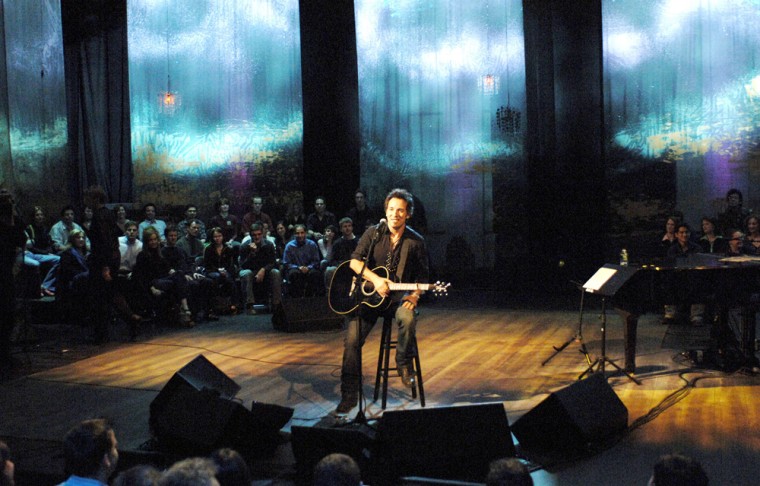 In this photo released by VH1, Bruce Springsteen performs on the stage at the Two River Theater in Red Bank, N.J., Monday, April 4, 2005. The acoustic performance was taped for airing on VH-1s Storytellers series. (AP Photo/VH1, Kevin Mazur)