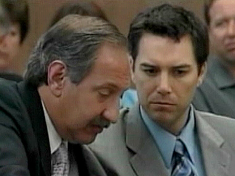 Defense attorney Mark Geragos, left, consults with defendant Scott Peterson last month during his trial.