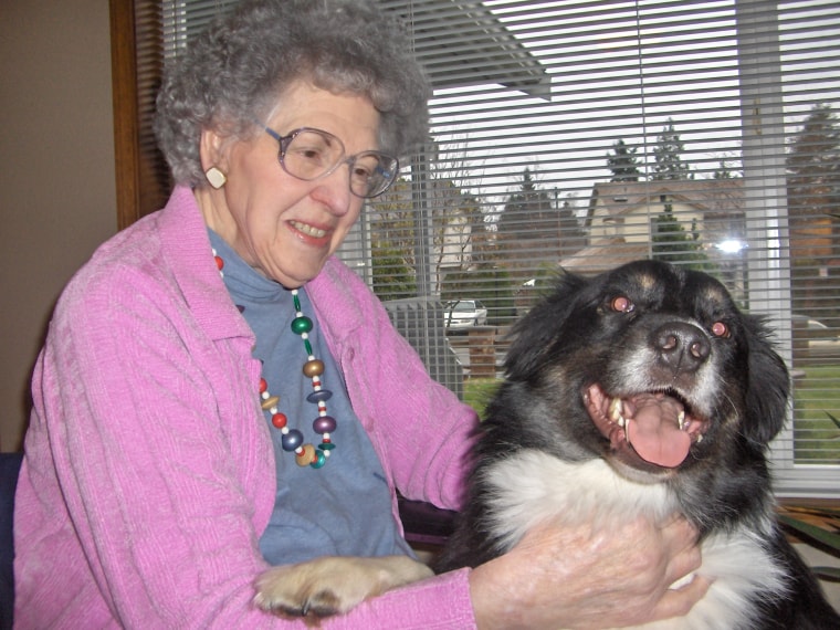 Delores loves the companionship of our dog Buster and he loves it when she sneaks him some food at the dinner table.