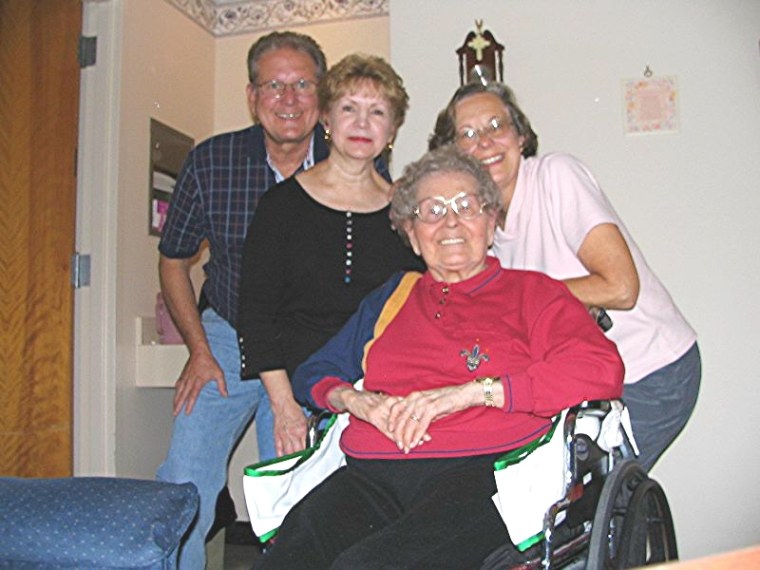 Mom with my brother Thomas Konopka, his wife Charlotte and me on the right.