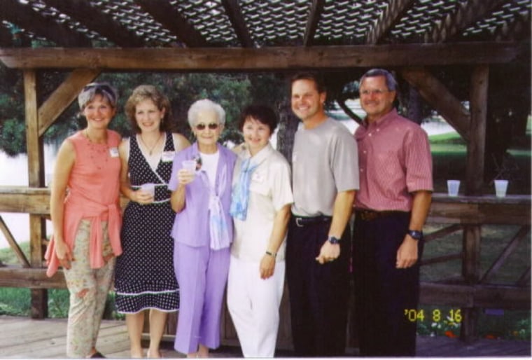 Loretta Ellison Skowronek surrounded by her five children at her 80th Birthday celebration in 2004.