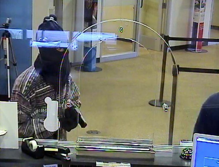 Image: Surveillance footage of an attempted robbery at a  Bank of America in Atlanta.