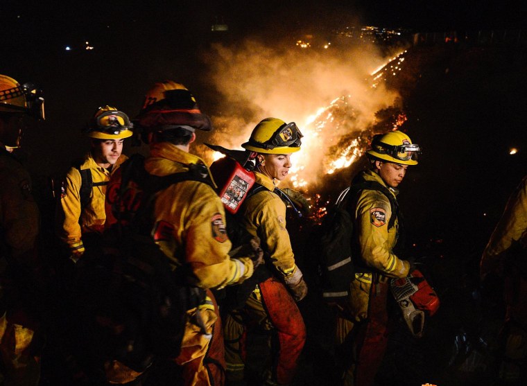 Fire Crews Battle California Wildfire Fanned By Strong Winds