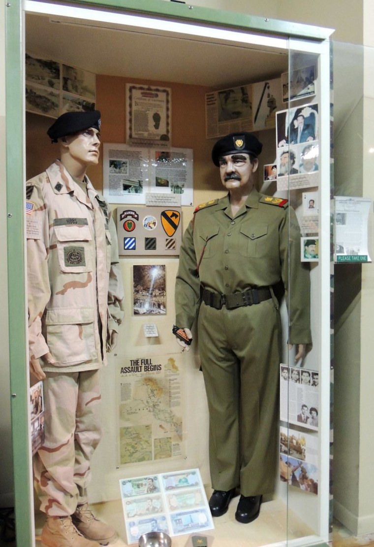 The Armed Forces History Museum in Largo, Fla., features a uniform once belonging to Saddam Hussein. The display includes a treat the dictator enjoyed, a Mars bar.
