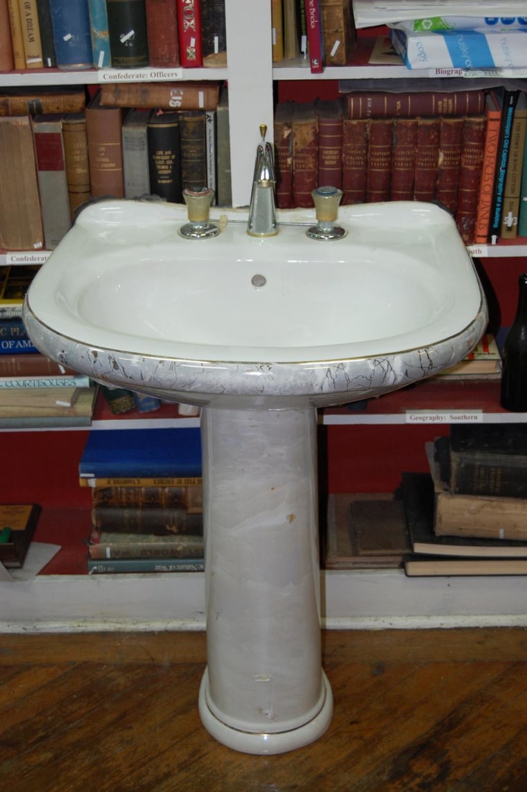 A sink taken from one of Saddam Hussein's palaces in 2003 is being put on display in Vicksburg, Miss.
