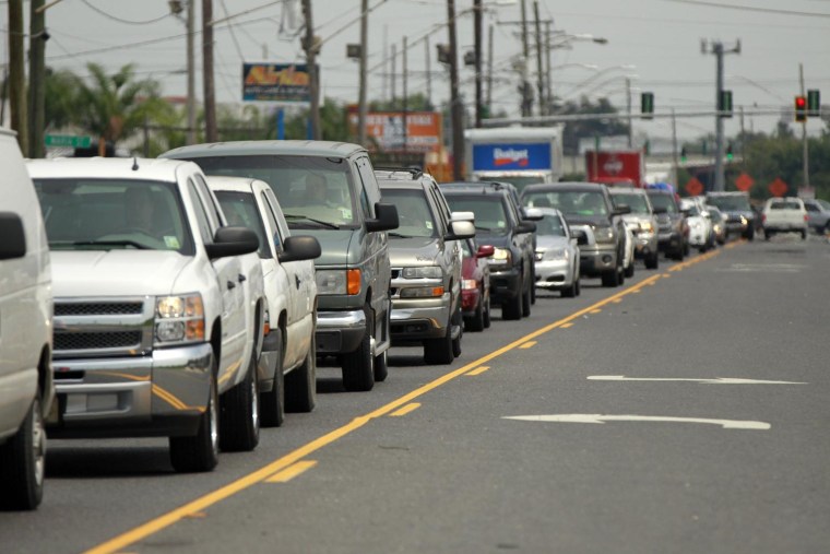 IMAGE: A line of traffic extends down Airline Highway in New Orleans.