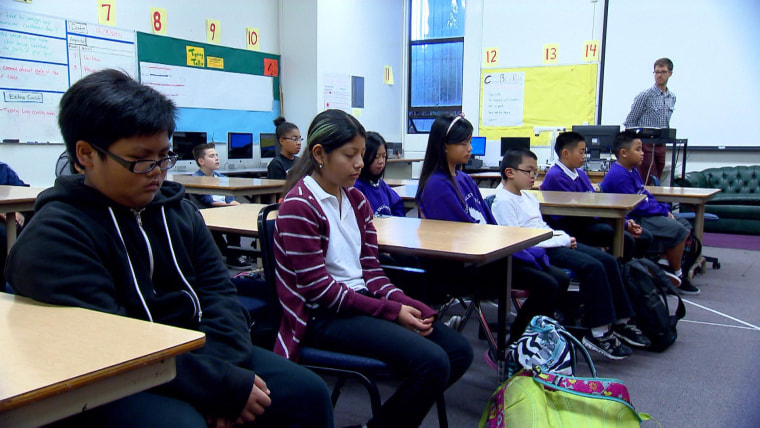 Image: Students at Visitacion Valley School in San Francisco meditate