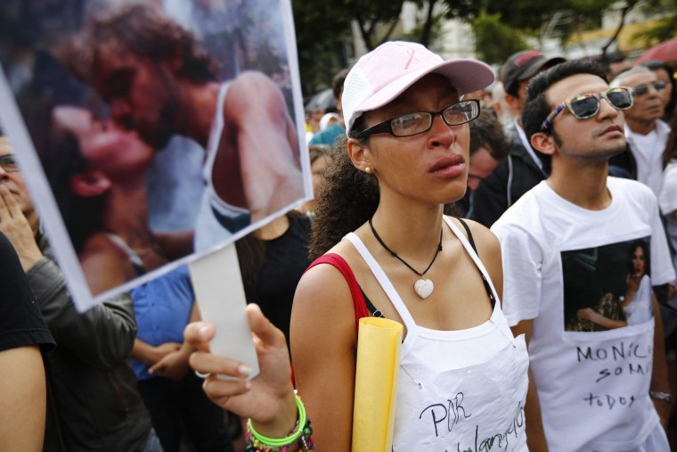 Image: A fan of former Miss Venezuela Monica Spear in Caracas.