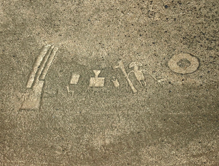 An aerial image shows geoglyphs outlined in Chile's Atacama Desert.