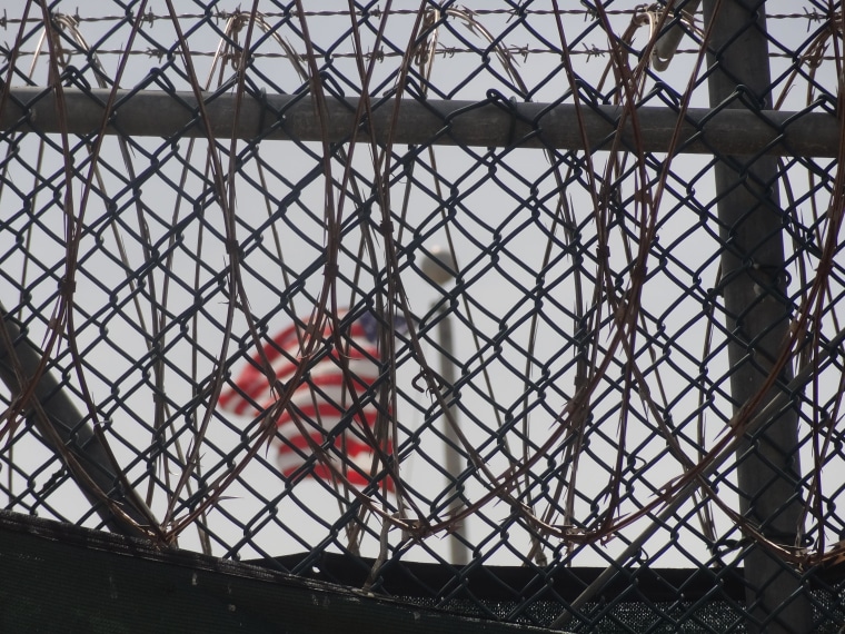 Guantanamo Bay Flag Through Barbed Wire