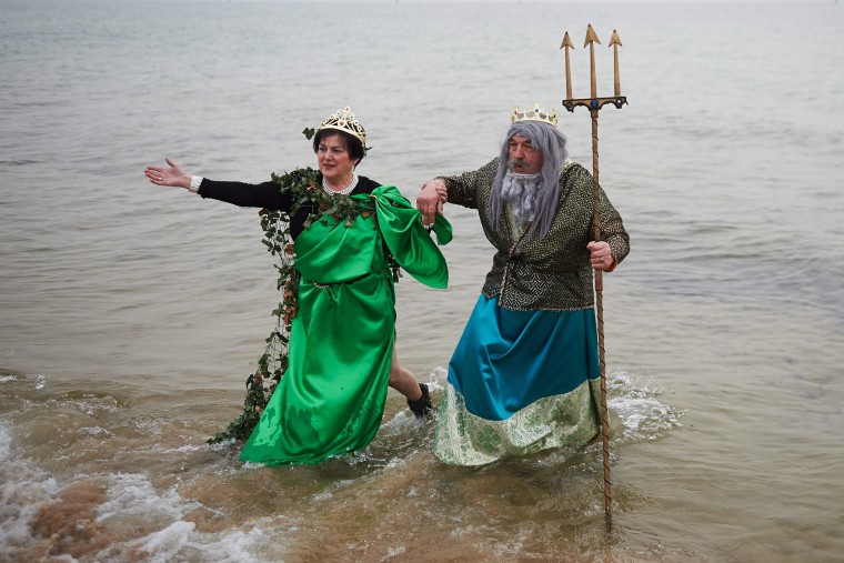 Brrrr! Swimmers Brave Icy Waters for New Year's Day Dip
