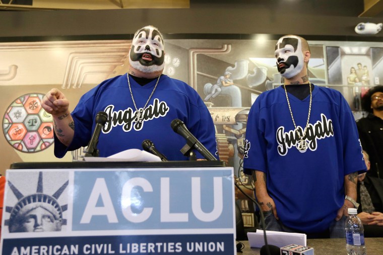 Image: Members of the Insane Clown Posse address the media in Detroit