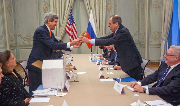 Image: John Kerry gives Idaho potatoes to Sergey Lavrov