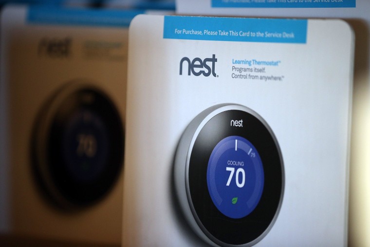 Image: The Nest Learning Thermostat is displayed at a Home Depot store