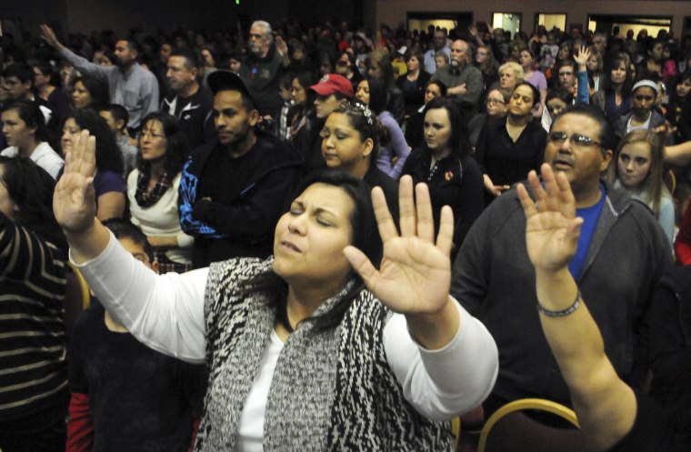 Image: Hundreds of residents attend a prayer vigil for victims of the Berrendo Middle School shooting in New Mexico