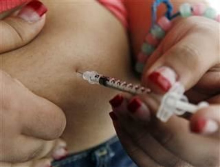 Teenager giving herself insulin injection
