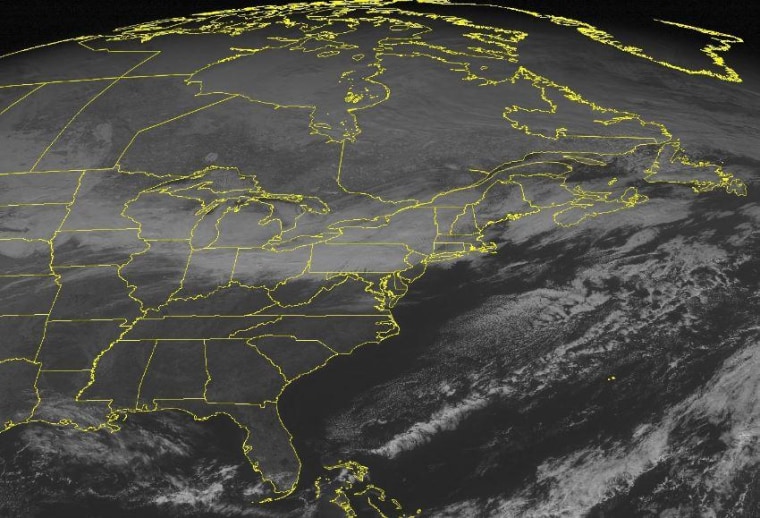 This NOAA satellite image taken Monday, Jan 20, 2014 at 01:45 PM EST shows cloudiness stretched from New England through the Mid Atlantic and Ohio Valley.