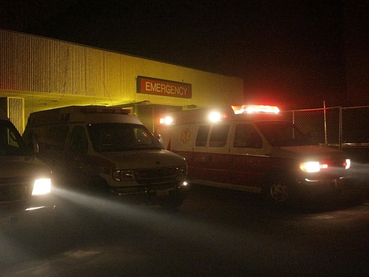 Ambulances line up outside an emergency room.