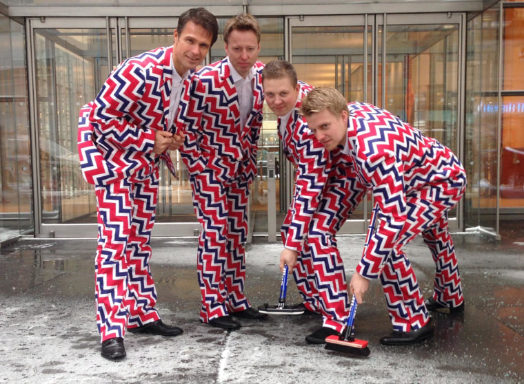 Members of  Norway's Men's Olympic Curling Team wear their new Sochi 2014 suits as they pose in New York on Tuesday.