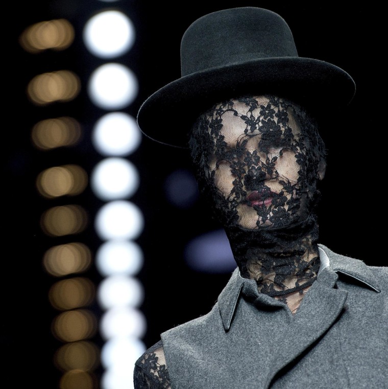 Image: A model shows a creation from the collection of designer Aziz Bekkaoui