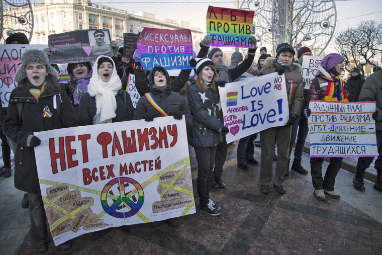 Image: Russian gay rights activists march along a Moscow boulevard on Jan. 19, 2014.