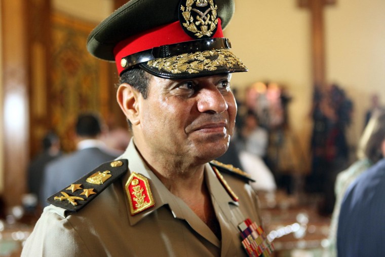 Image: Egypt's president promotes army chief to top rank
