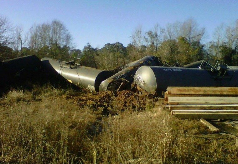 Image: A train derailed in New Augusta, Miss. on Friday Jan. 31, 2014.