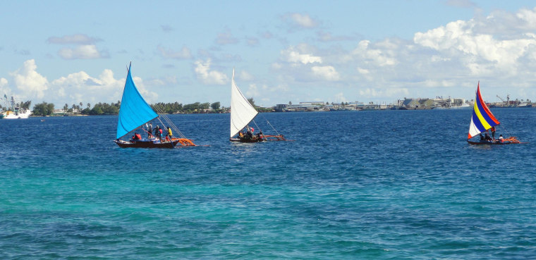 Image: Outrigger canoes in the Marshall Islands on Aug. 29, 2013.