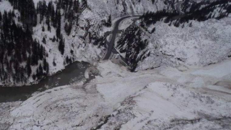 Avalanche debris covers a 50 mile stretch of road outside Valdez, Alaska