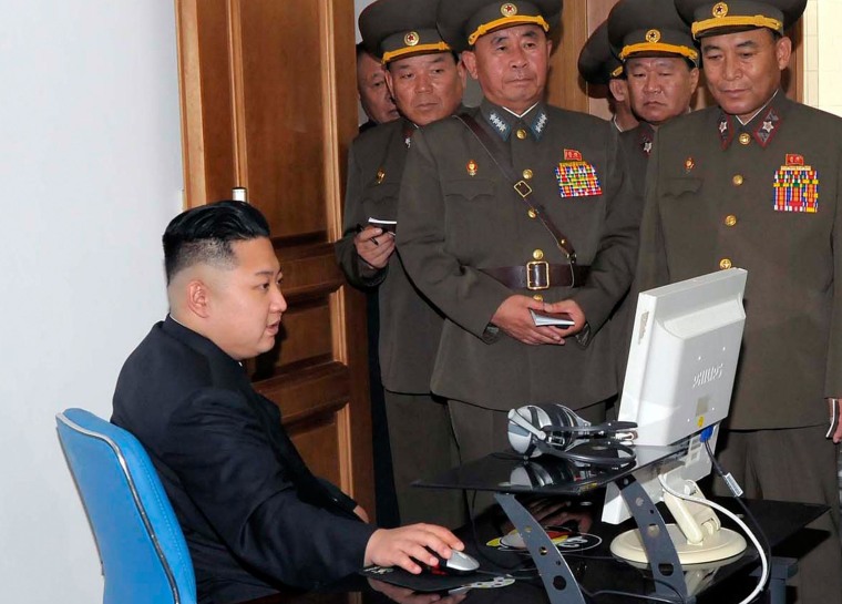 Image: North Korean leader Kim looks at a computer screen