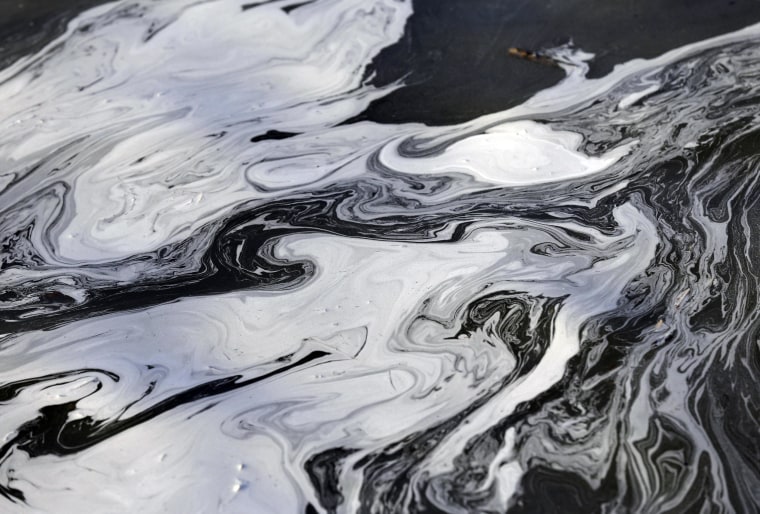 Image: Coal ash swirls on the surface of the Dan River