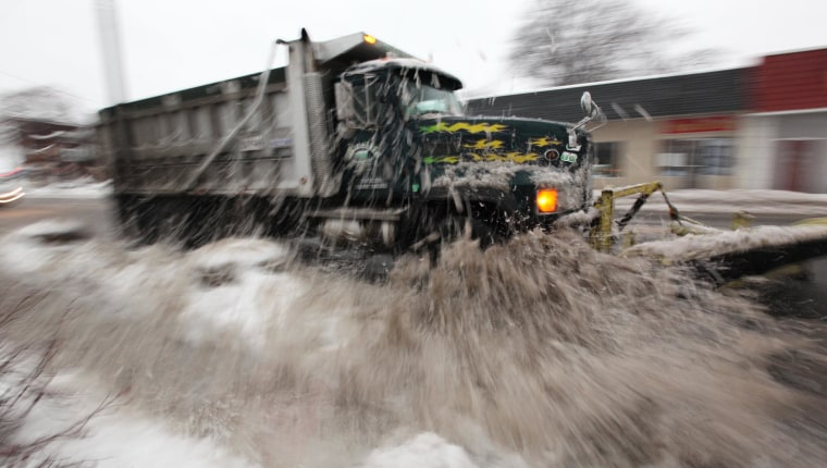 Image:  A plow cleans up North Ave. in Garwood, N.J.